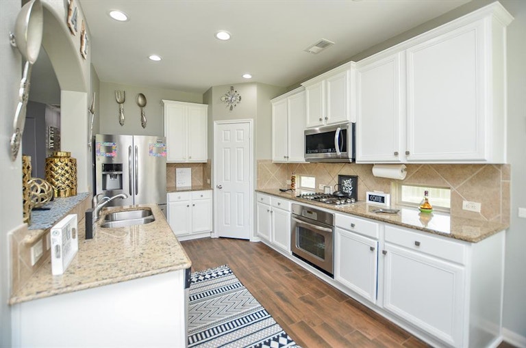 Photo 9 of 32 - 19202 Opul Trails Ct, Richmond, TX 77407