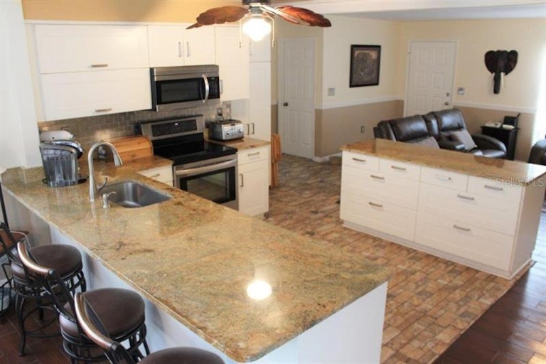 Photo 6 of 20 - 10315 Adler St, Spring Hill, FL 34608