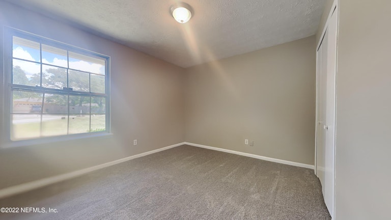 Photo 12 of 21 - 8038 Cayuga Trl S, Jacksonville, FL 32244