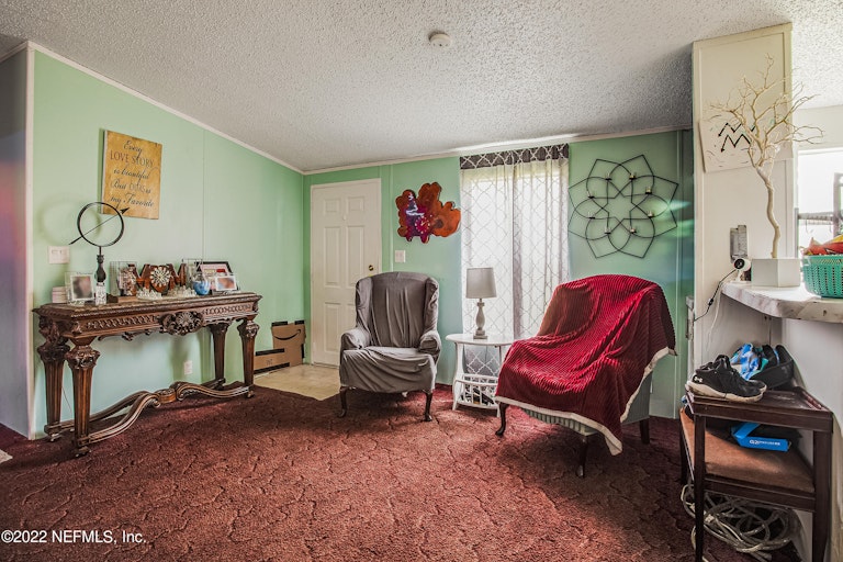 Photo 11 of 16 - 28053 Roundup Pl, Hilliard, FL 32046