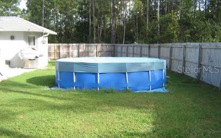 Photo 5 of 5 - 20 Zither Ct, Palm Coast, FL 32164