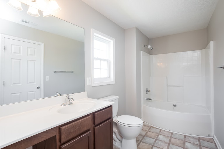 Photo 13 of 25 - 113 Trayesan Dr, Holly Springs, NC 27540