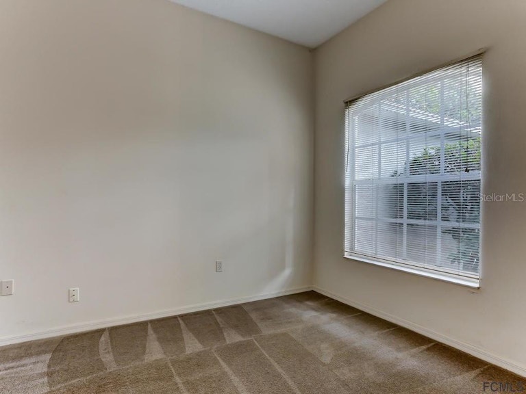 Photo 23 of 43 - 8 Pine Cedar Dr, Palm Coast, FL 32164