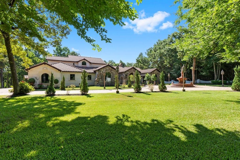 Photo 5 of 51 - 2426 Blue Lake Dr, Magnolia, TX 77354