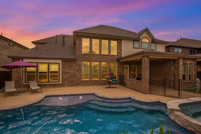 Photo 1 of 47 - 10610 Grace Hollow Dr, Cypress, TX 77433
