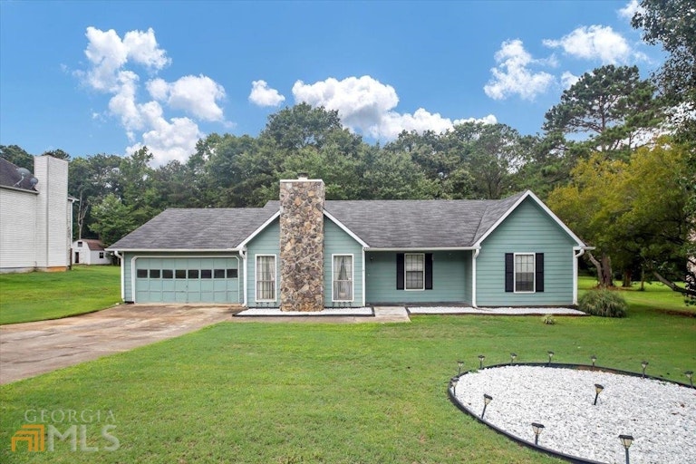 Photo 1 of 22 - 11525 Matthews Trl, Hampton, GA 30228