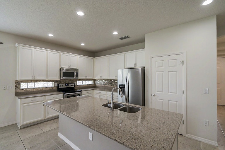 Photo 9 of 29 - 3343 Bethpage Loop, Mount Dora, FL 32757