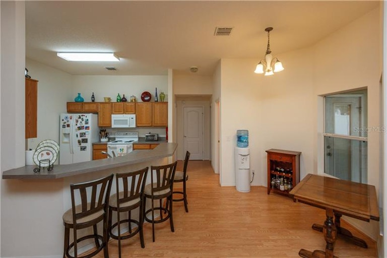 Photo 11 of 25 - 469 Newhearth Cir, Winter Garden, FL 34787