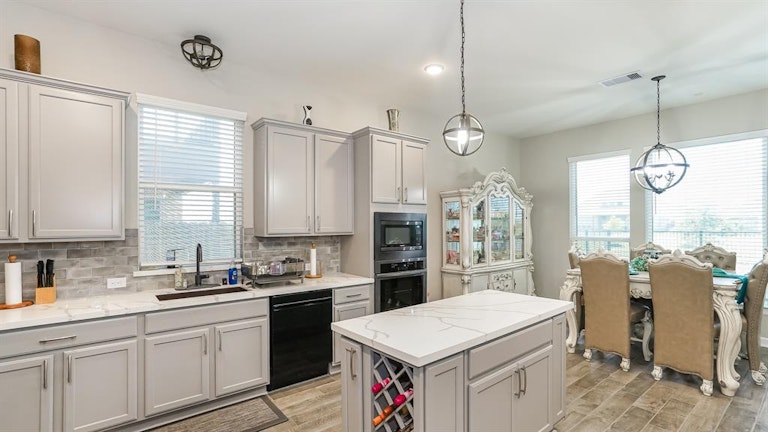 Photo 12 of 39 - 6707 Eastchester Dr, Katy, TX 77493