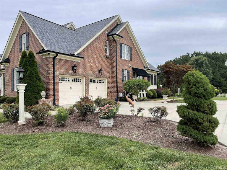 Photo 2 of 51 - 6228 Mitchell Mill Rd, Zebulon, NC 27597