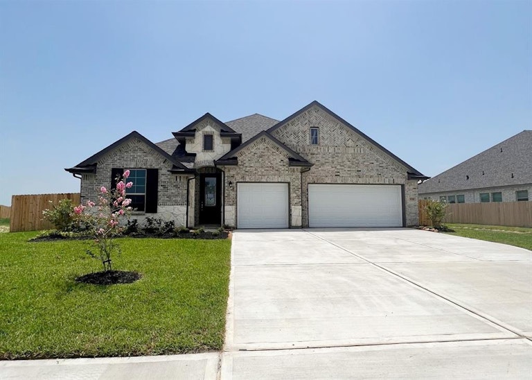 Photo 1 of 16 - 9710 Colonial Downs Dr, Baytown, TX 77523