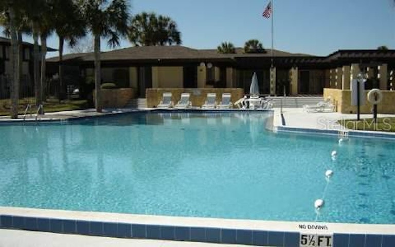 Photo 3 of 4 - 54 Club House Dr, Palm Coast, FL 32137