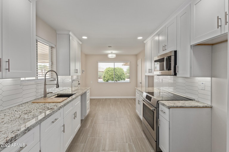 Photo 13 of 31 - 9039 N Balboa Dr, Sun City, AZ 85351