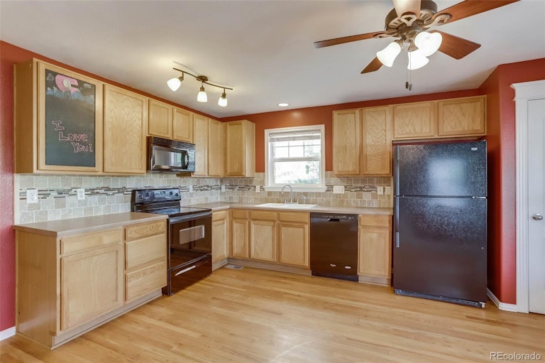 Photo 9 of 40 - 10712 Dayton Way, Commerce City, CO 80640