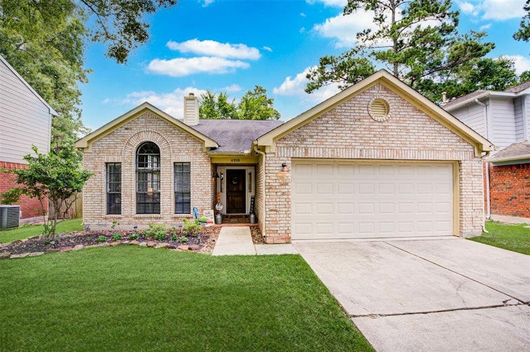 Photo 1 of 48 - 4918 Dobbin Springs Ln, Kingwood, TX 77345