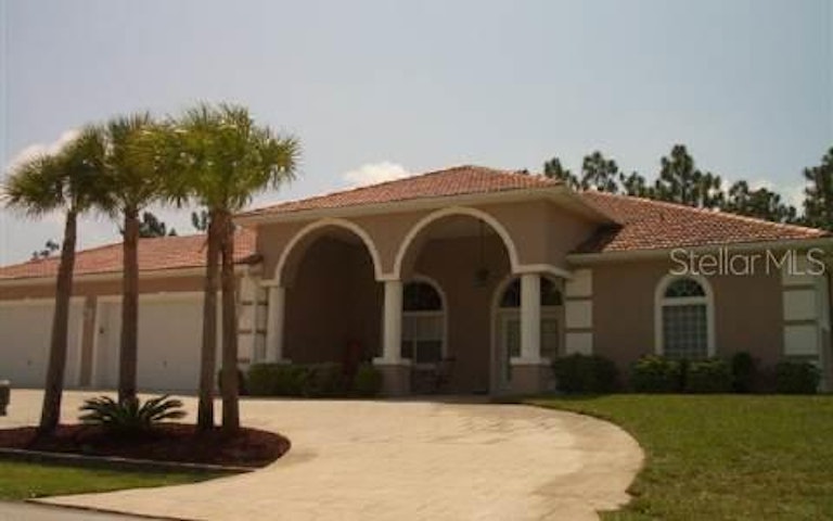 Photo 1 of 1 - 62 Woodbury Dr, Palm Coast, FL 32164