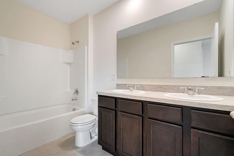 Photo 12 of 19 - 2585 Shamrock St, Tavares, FL 32778