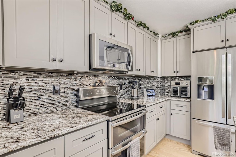 Photo 7 of 31 - 9281 W Indore Dr, Littleton, CO 80128