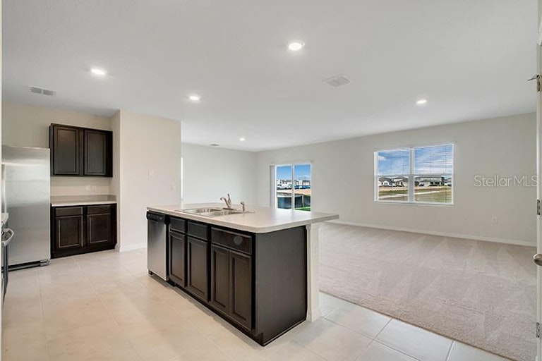 Photo 2 of 19 - 2585 Shamrock St, Tavares, FL 32778