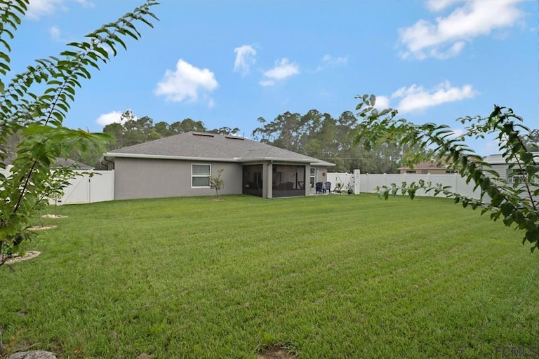 Photo 35 of 40 - 39 Rickenbacker Dr, Palm Coast, FL 32164