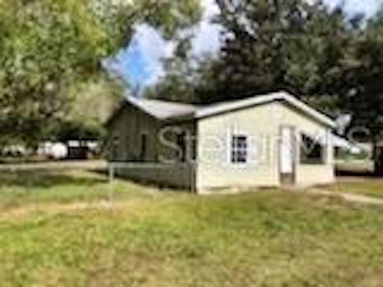 Photo 5 of 17 - 704 Lime Ave, Dundee, FL 33838