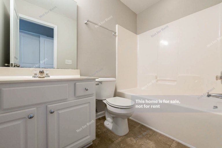 Photo 13 of 14 - 7631 Satinwing Ln, Raleigh, NC 27617