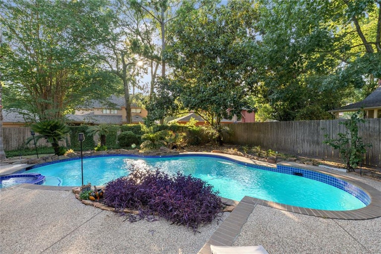 Photo 2 of 41 - 2715 Rustic Woods Dr, Kingwood, TX 77345