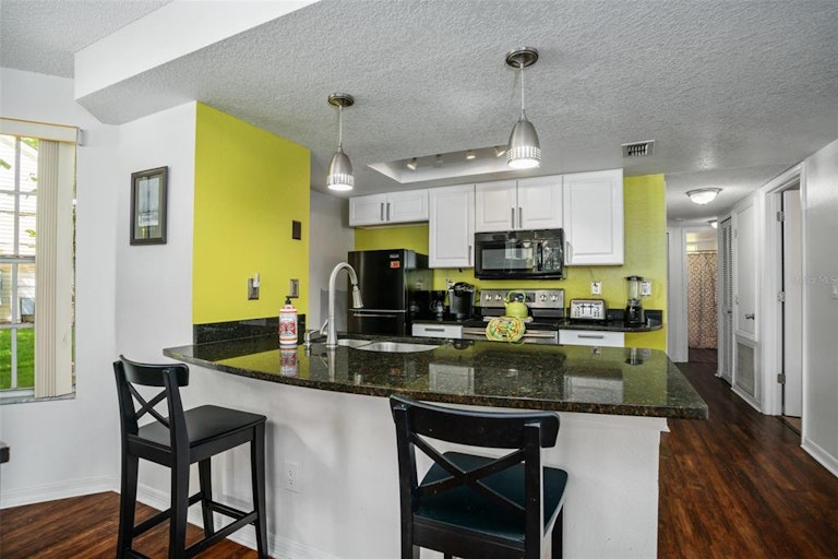Photo 9 of 30 - 5003 Laguna Bay Cir #15, Kissimmee, FL 34746