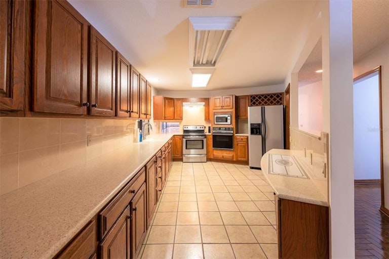 Photo 13 of 64 - 1401 N Riverhills Dr, Temple Terrace, FL 33617