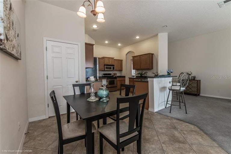 Photo 8 of 23 - 8416 Lake Waverly Ln, Orlando, FL 32829