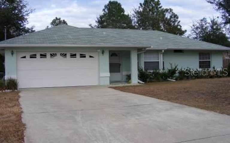 Photo 1 of 4 - 5 White Horse Ln, Palm Coast, FL 32164
