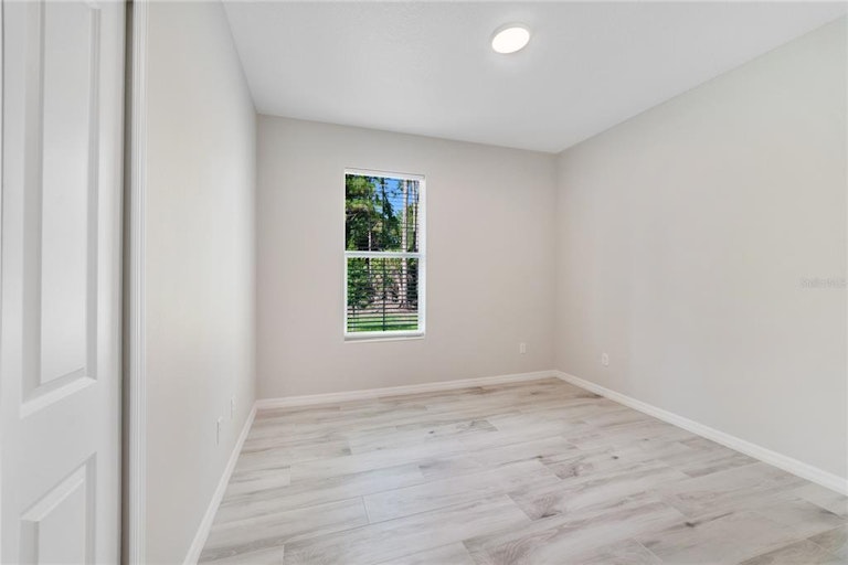 Photo 10 of 17 - 3373 Newmark Dr, Deltona, FL 32738