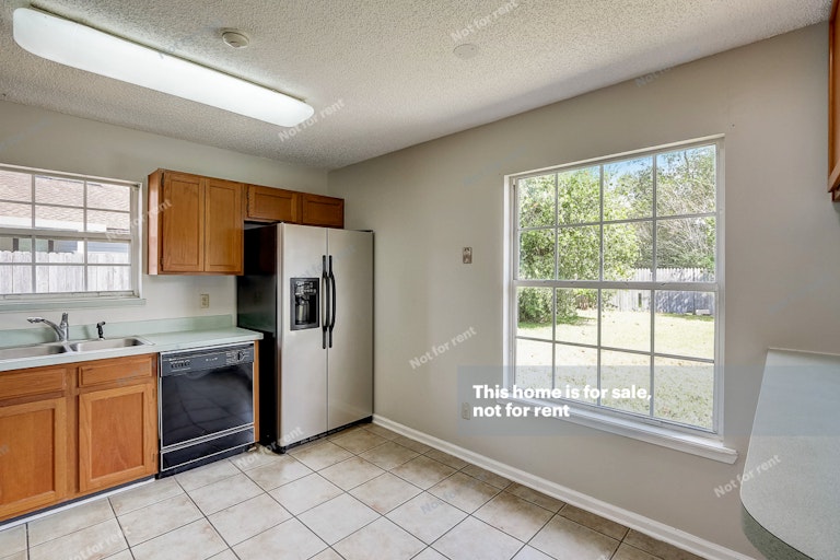 Photo 16 of 27 - 8029 Swamp Flower Dr, Jacksonville, FL 32244