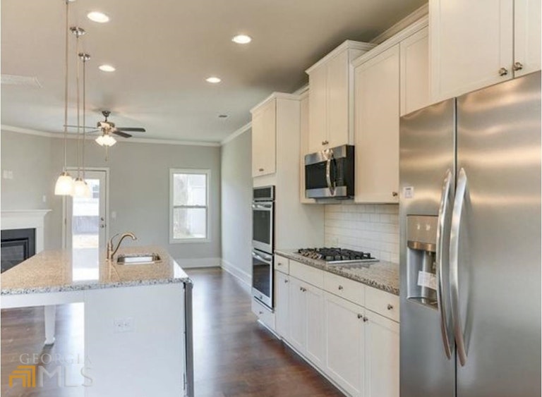 Photo 3 of 27 - 9927 Stretford Rd, Douglasville, GA 30135