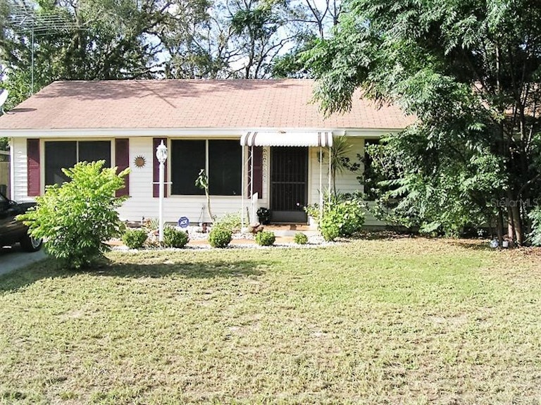Photo 1 of 23 - 6191 Pinehurst Dr, Spring Hill, FL 34606