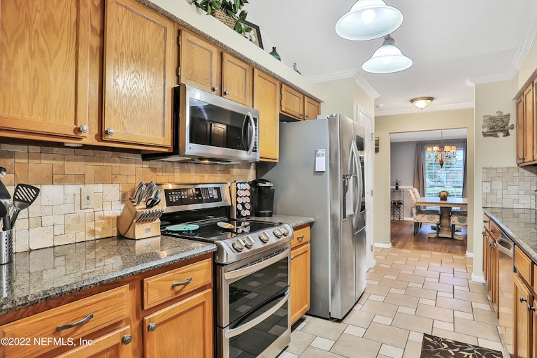 Photo 14 of 36 - 1444 Starboard Ct, Fleming Island, FL 32003