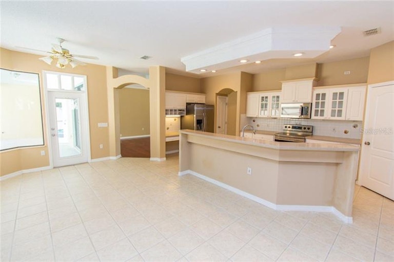 Photo 10 of 22 - 1053 Archway Dr, Spring Hill, FL 34608