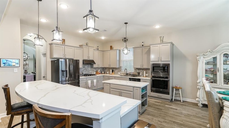 Photo 9 of 39 - 6707 Eastchester Dr, Katy, TX 77493