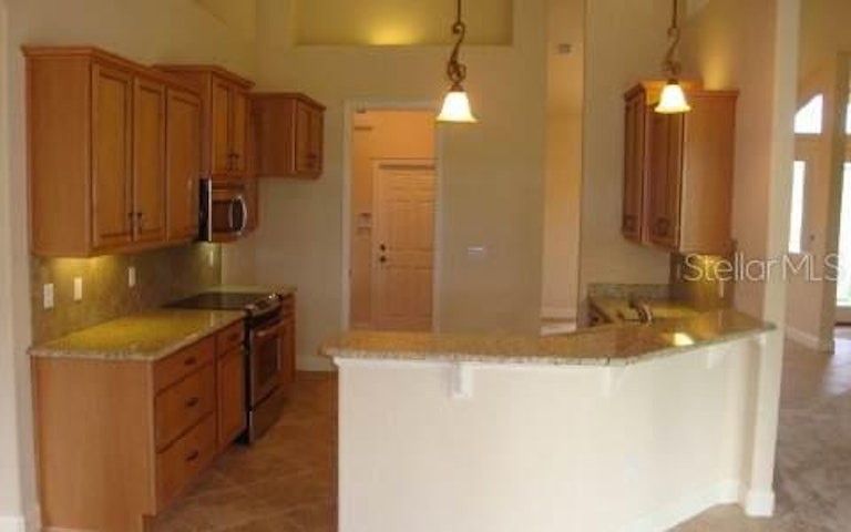 Photo 3 of 24 - 102 S Coopers Hawk Way, Palm Coast, FL 32164