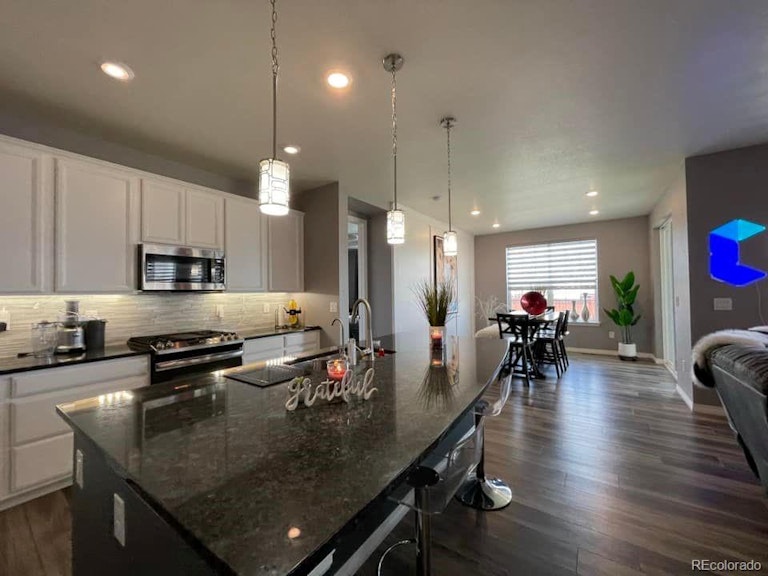 Photo 15 of 38 - 14409 Dahlia St, Thornton, CO 80602