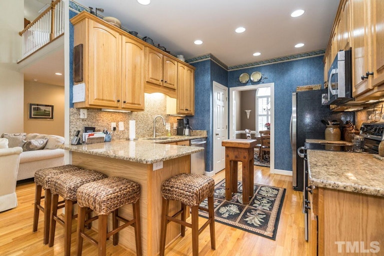 Photo 10 of 40 - 1027 Loch Lomond Dr, Clayton, NC 27520