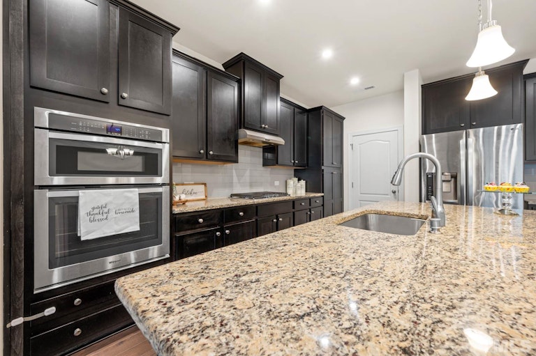 Photo 13 of 35 - 720 Lampwick Ln, Cary, NC 27513