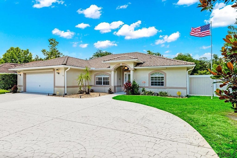 Photo 1 of 60 - 52 Rockefeller Dr, Palm Coast, FL 32164