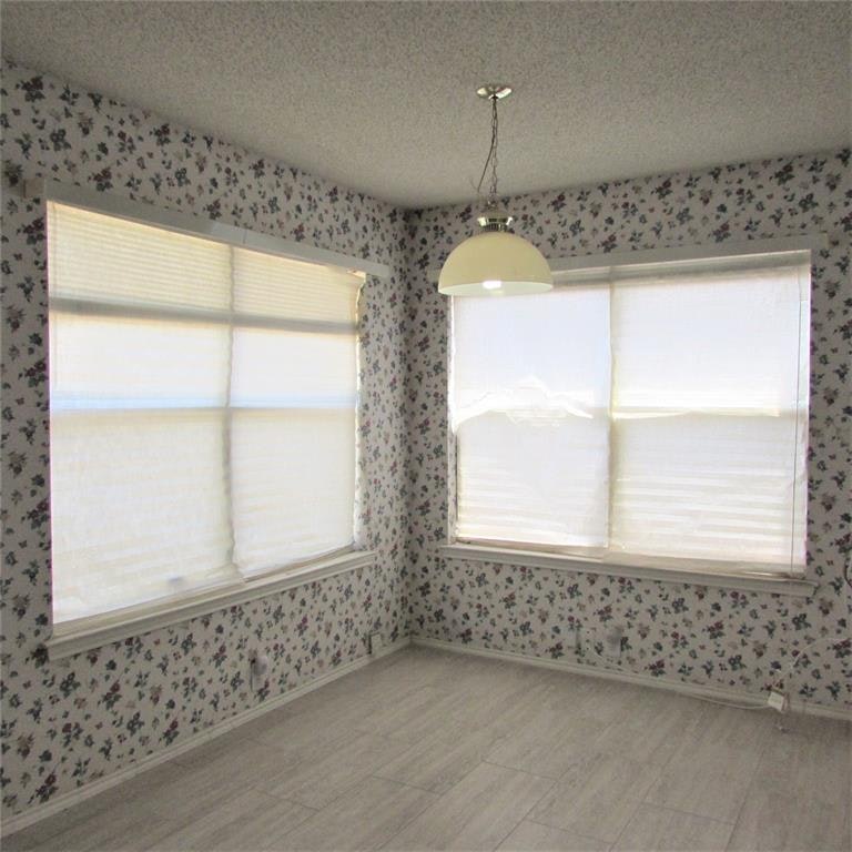 Photo 12 of 32 - 1345 Mill Wood Ln, Garland, TX 75040