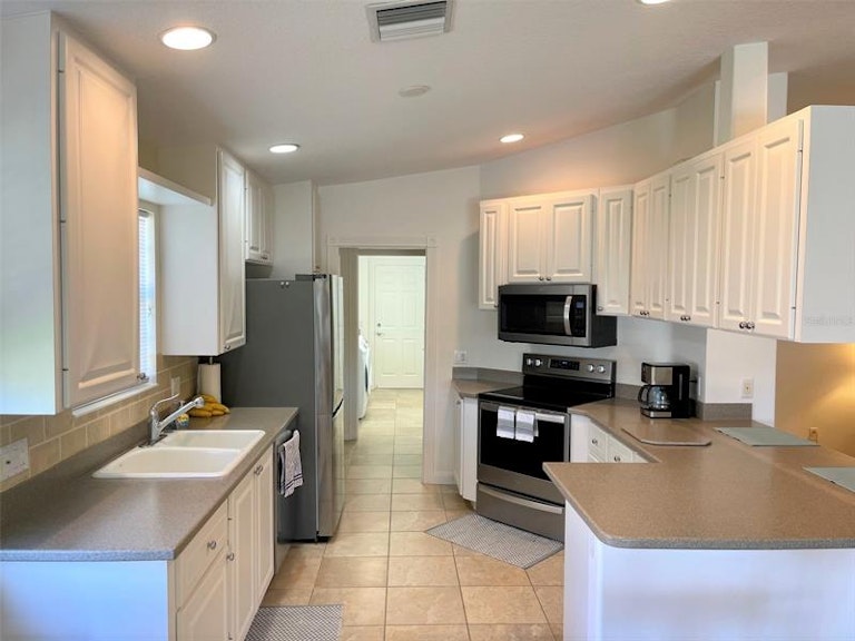Photo 7 of 33 - 5979 Benevento Dr, Sarasota, FL 34238