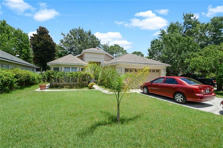 Photo 2 of 33 - 3829 Pickwick Dr, Orlando, FL 32817