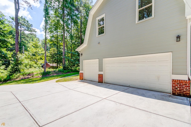 Photo 45 of 51 - 477 Tom Smith Rd SW, Lilburn, GA 30047