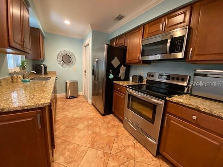 Photo 7 of 27 - 7921 Segovia St, Orlando, FL 32822
