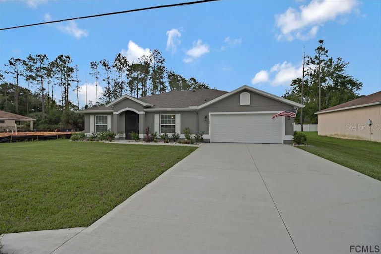 Photo 3 of 40 - 39 Rickenbacker Dr, Palm Coast, FL 32164