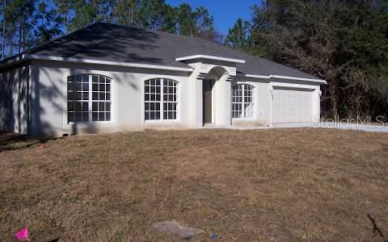 Photo 1 of 1 - 89 Palmwood Dr, Palm Coast, FL 32164